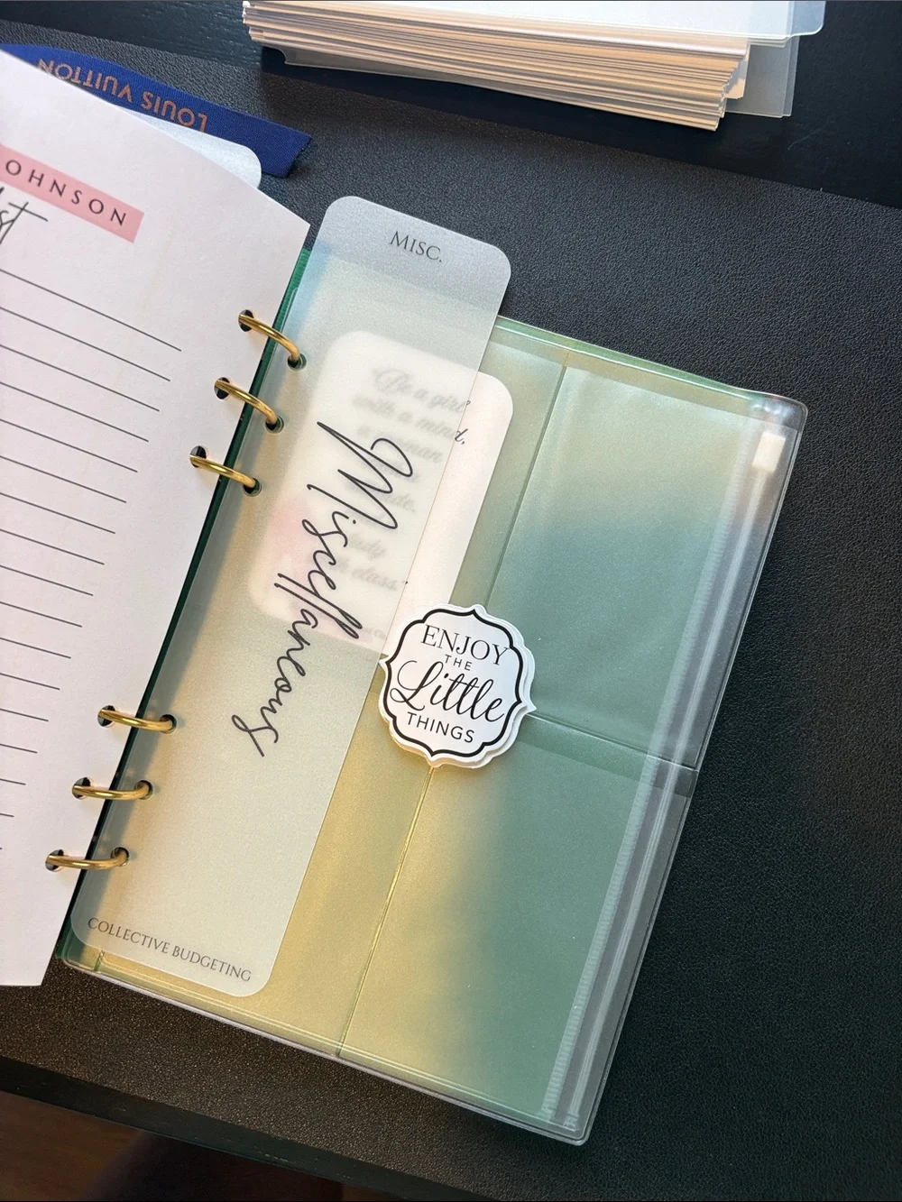 A5 Planner Pages with Blue Ribbon and Gold Rings.